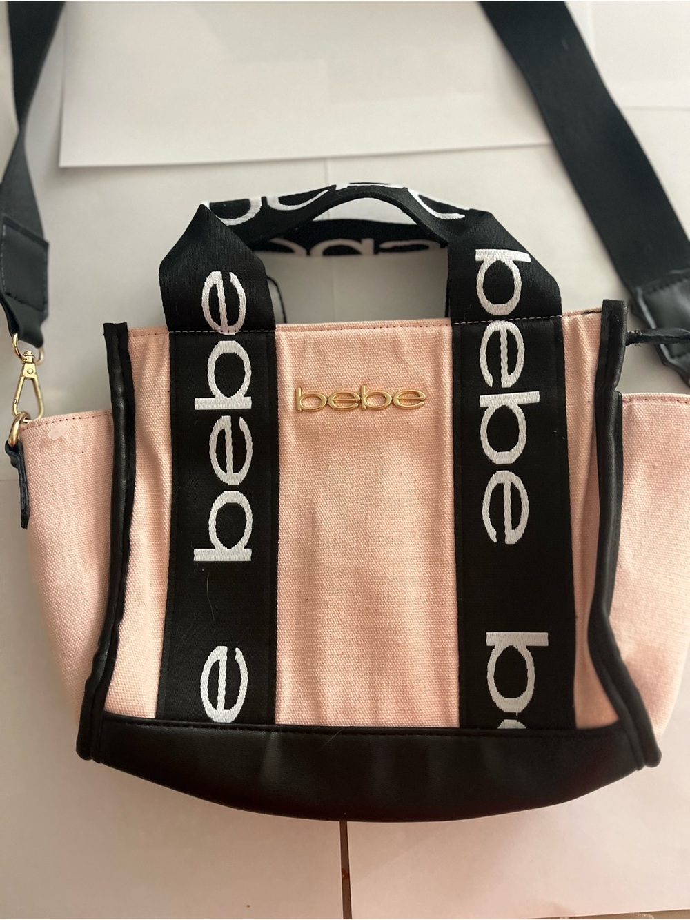 bebe Pink Canvas Tote with Black Logo Straps and Gold Emblem